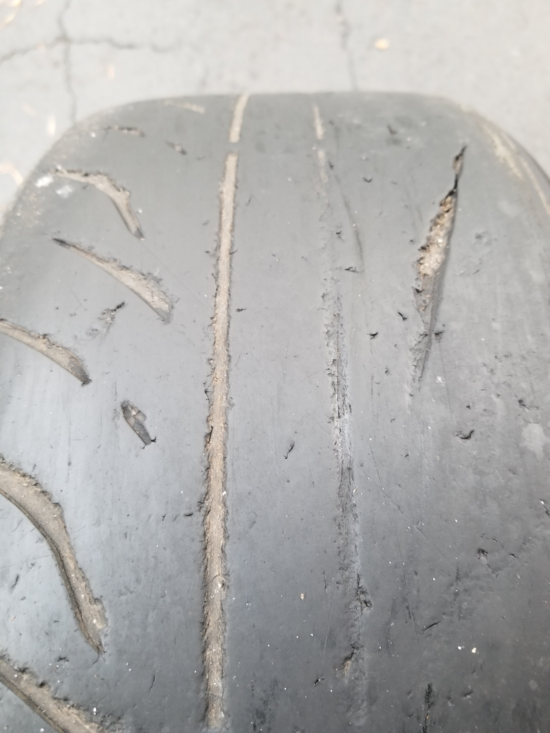 Rear passenger, one hell of a gouge. New tires will go on tomorrow evening, these will be recycled.